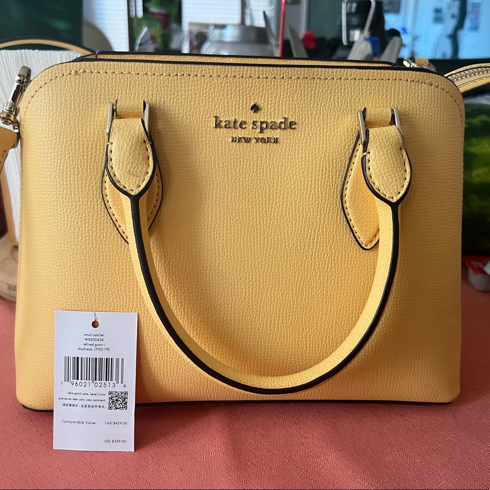 Kate spade cross body purse. With tags.